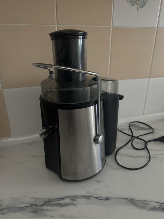 Электрическая соковыжималка