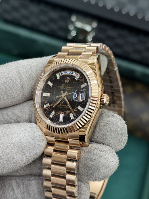 Rolex Day-Date 40 Baguette Eisenkiesel