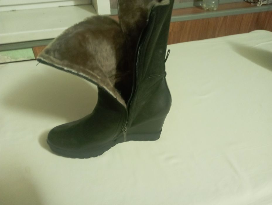 Продаю зимние сапоги