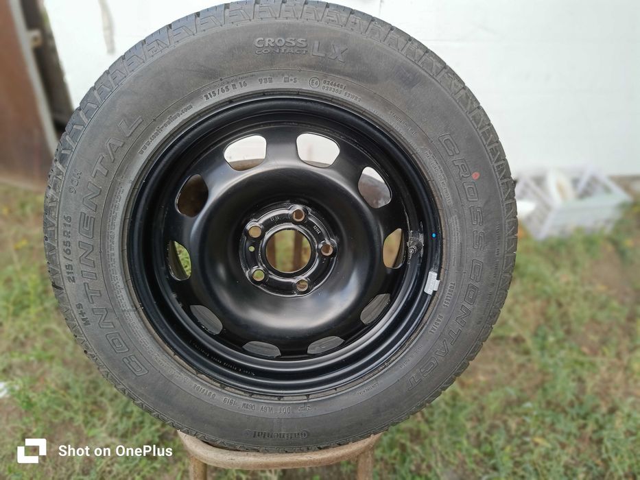 Продам шины 215х65 r16 с диском летние CONTINENTAL