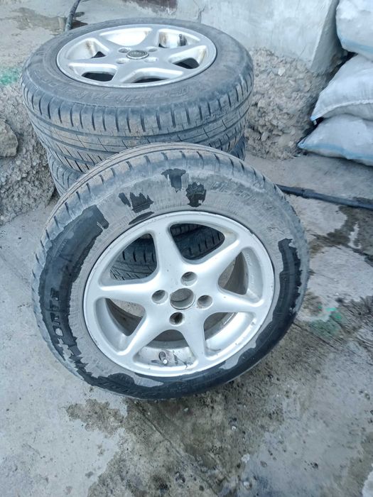 Продам диски с резиной на Ауди.