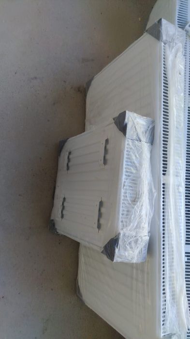 Радиаторы новые белые Lemax