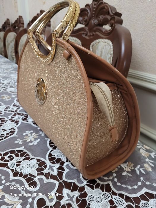 Ayollar sumkasi yangi