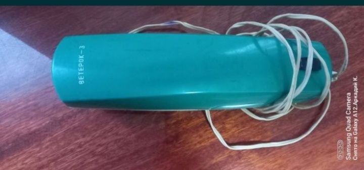 Пылесос бытовой.