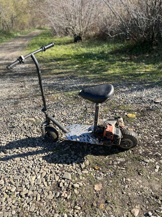 Trotineta cu motor dau si la schimb