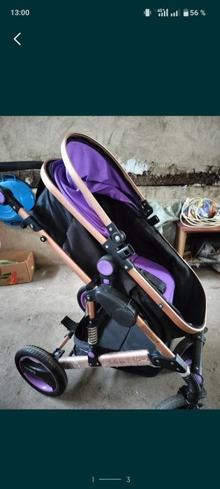 Коляска детская фиолетовая