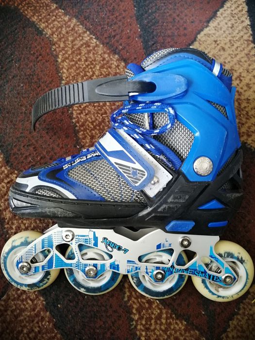 Роликовые коньки