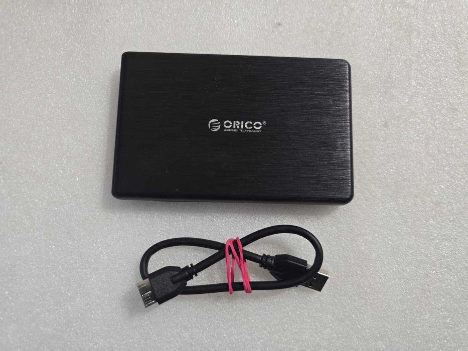 Hard Disk extern slim Orico 1TB, 5400rpm USB 3.0, 2.5" - poze reale