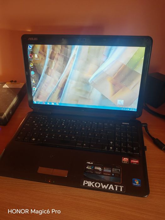 Laptop ASUS AMD Athlon Dual Core - Funcțional, cu cablu alimentare