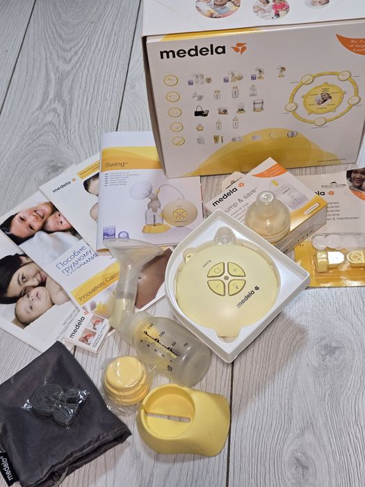 MEDELA Молокоотсос SWING электрический