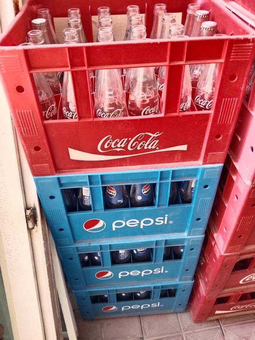 Tara, kola butilka yashigi bilan