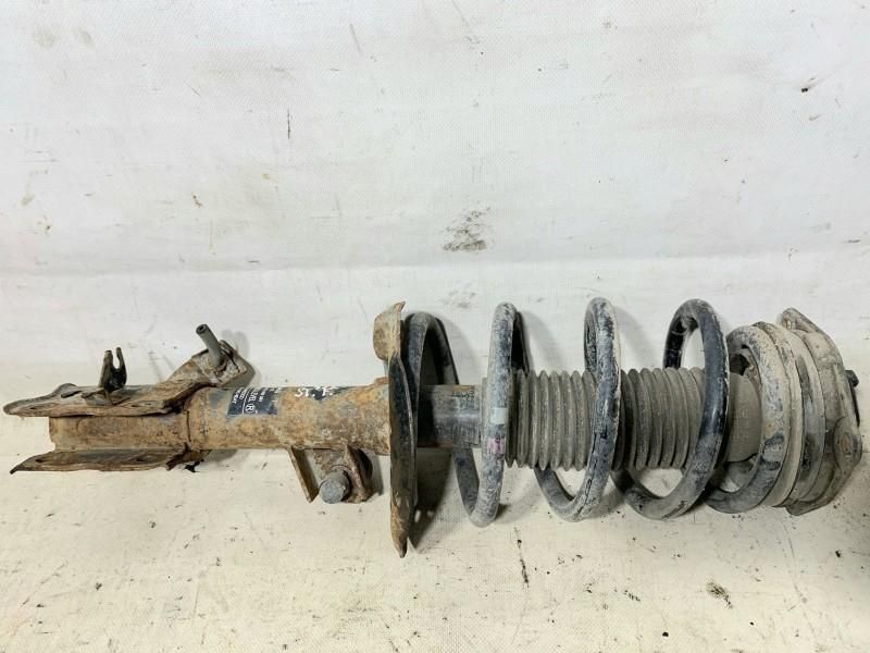 Amortizor fata stanga fata Nissan Qashqai plus 2 J10 2.0 dci M9R 54303