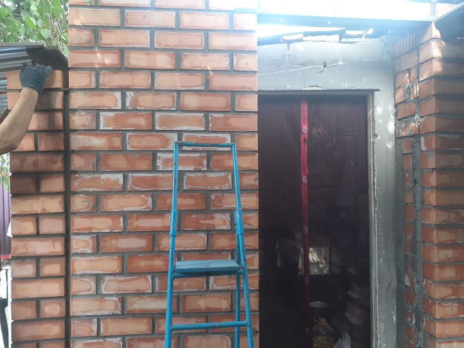 Кладка кирпича штукатурка