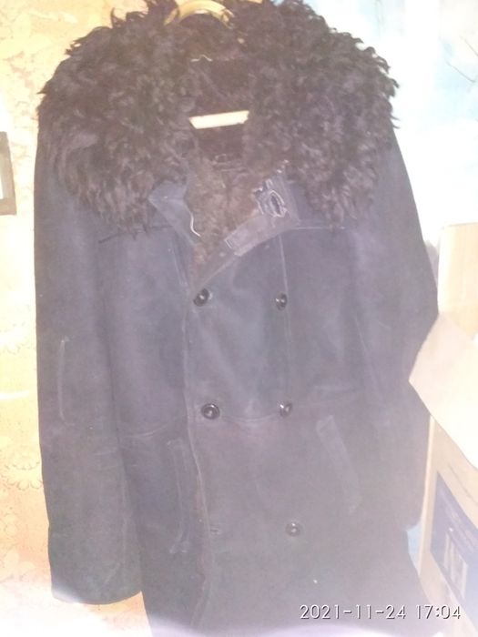 Полушубок овчинный новый.