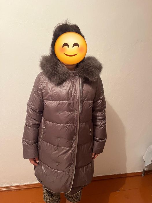 Продам пуховик новый