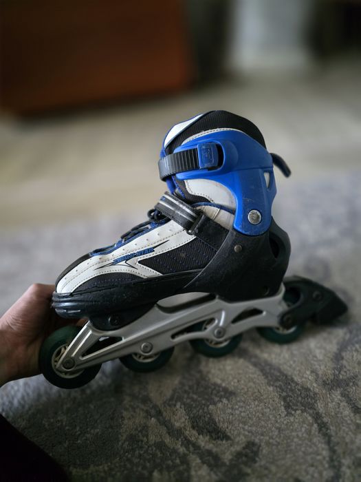 Роликовые коньки