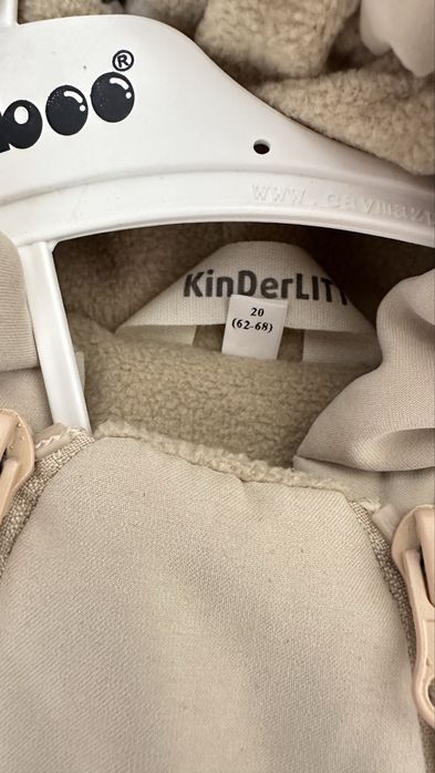 Демисезонный  комбинезон ,очень тёплый.