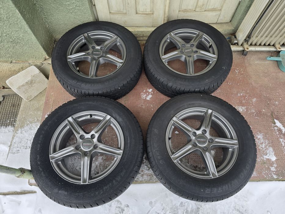 215 65 R 16 jante cu cauciucuri de iarna DOT 2023 ~ 5 x 108 ET 50 KUGA