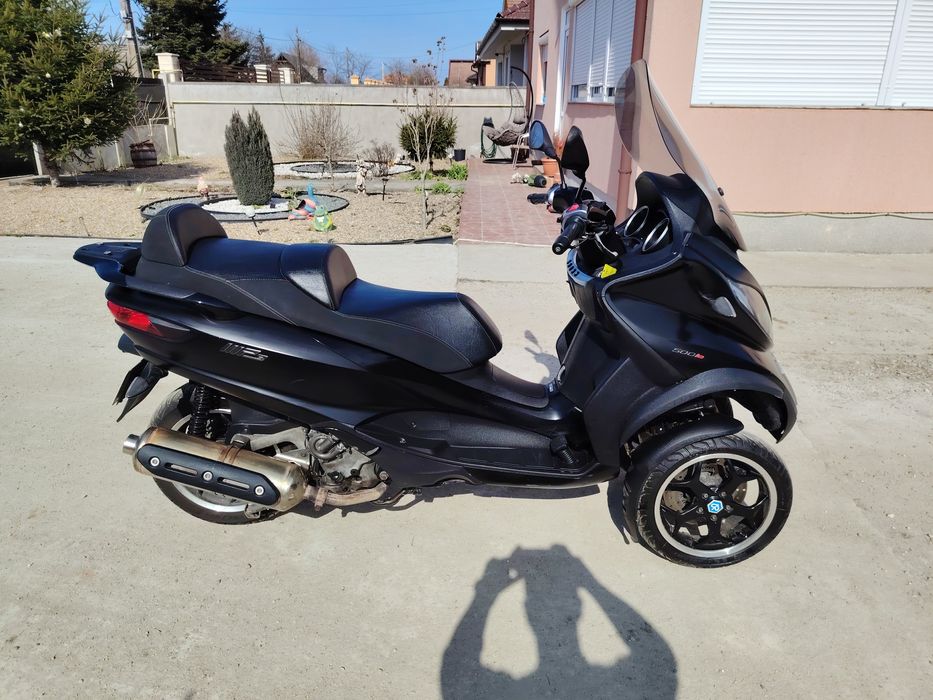 Piaggio MP3 500 ie se conduce cu categoria B