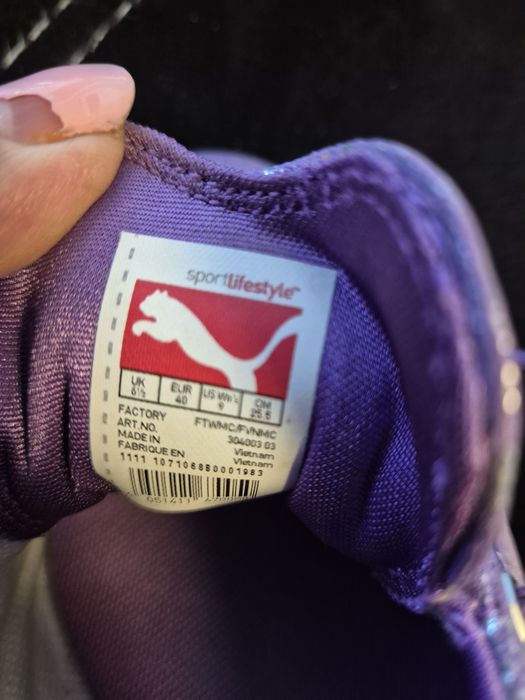 Продавач маратонки Puma