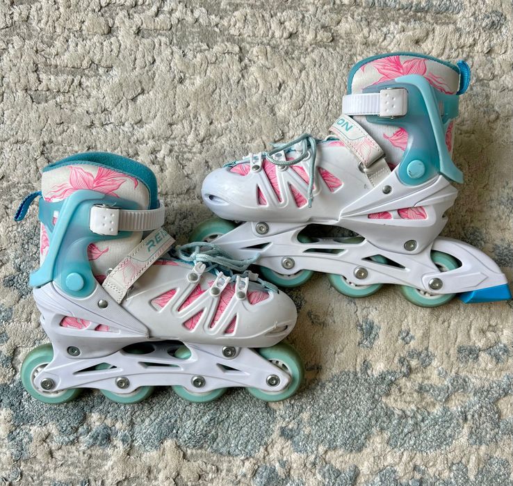 Роликовые коньки