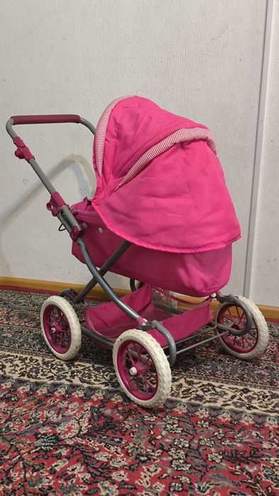 Детская коляска и мотоцикл игрушки