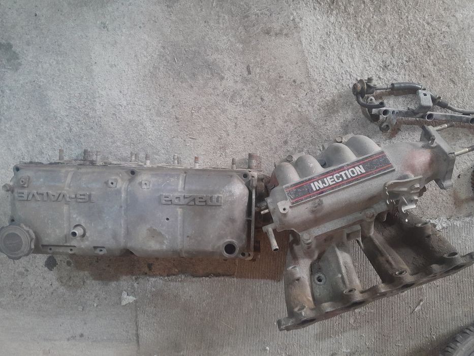 Продам головку мазда 323