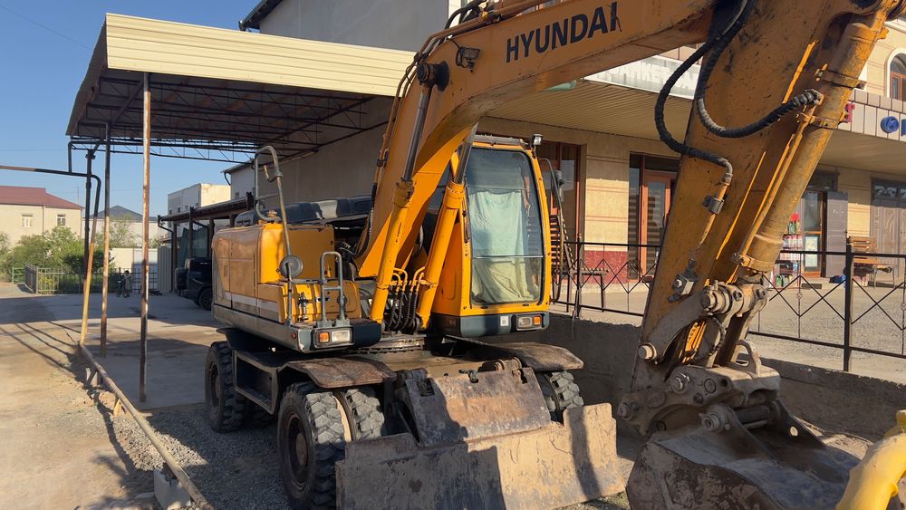 Ekskavator Hyundai 140 W. Экскаватор Хундай 140