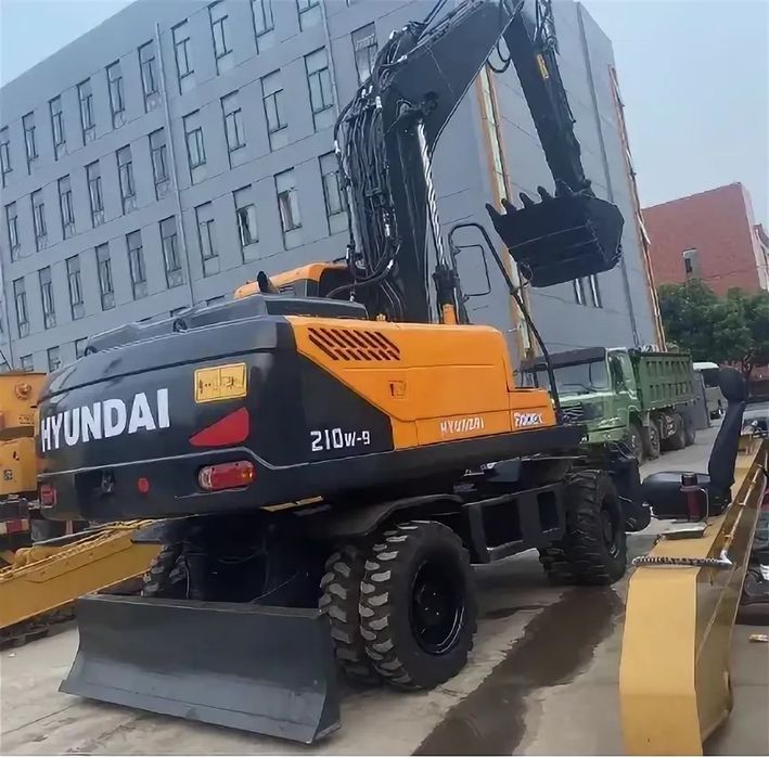 Услуги аренды колесного экскаватора