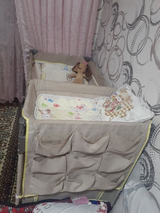 Детский манежли кровать сотилади. Холати зор. Коп ишлатилмаган