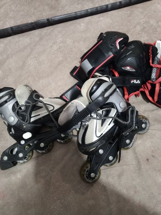 Роликовые коньки