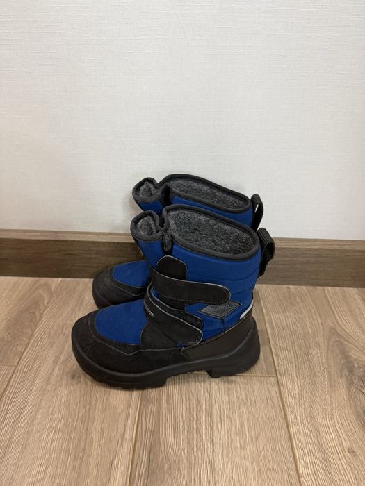 Продам зимние сапоги kuoma