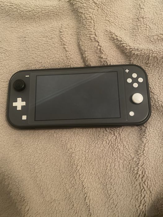 Nintendo Switch Lite прошитая обменяю на пс4 прошитаю или продам