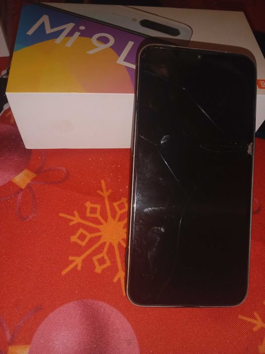 Телефони за части