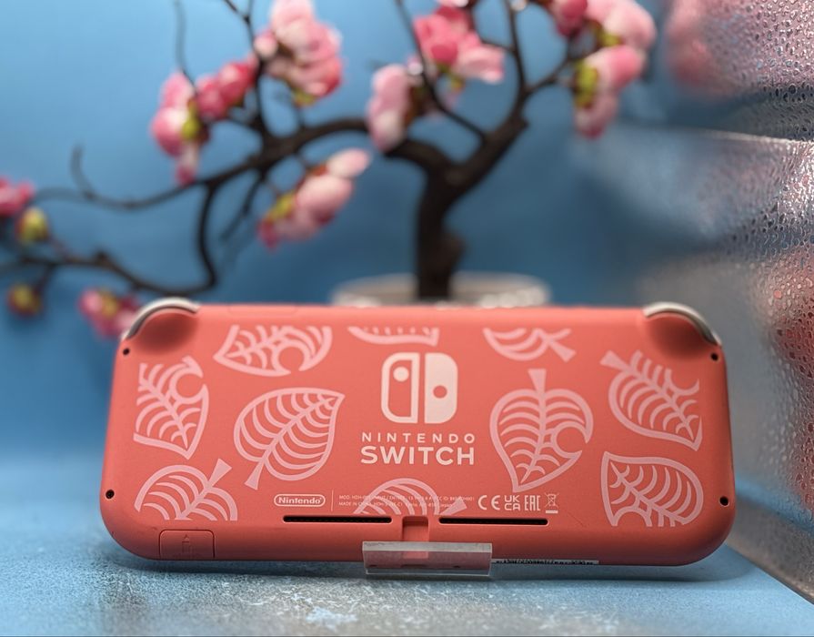 Nintendo Switch Lite (Animal Crossing Edition) + Super Mario Odyssey