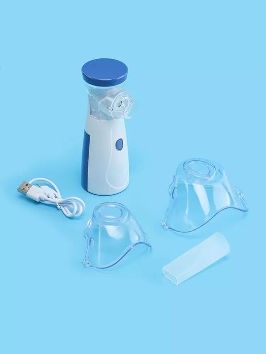 Nebulizer inhaleri tarmoqdan ham, adapter orqali ham, ikkita barmoq ba