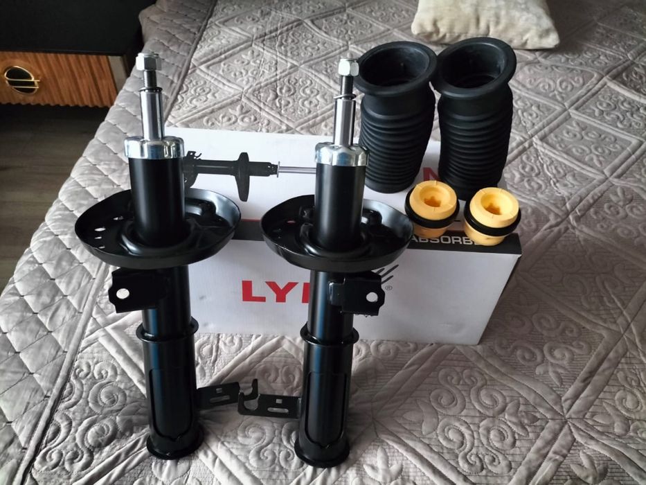 Стойки передние шевроле круз