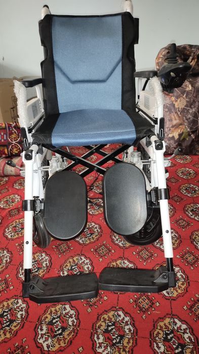 Электрическая инвалидная коляска