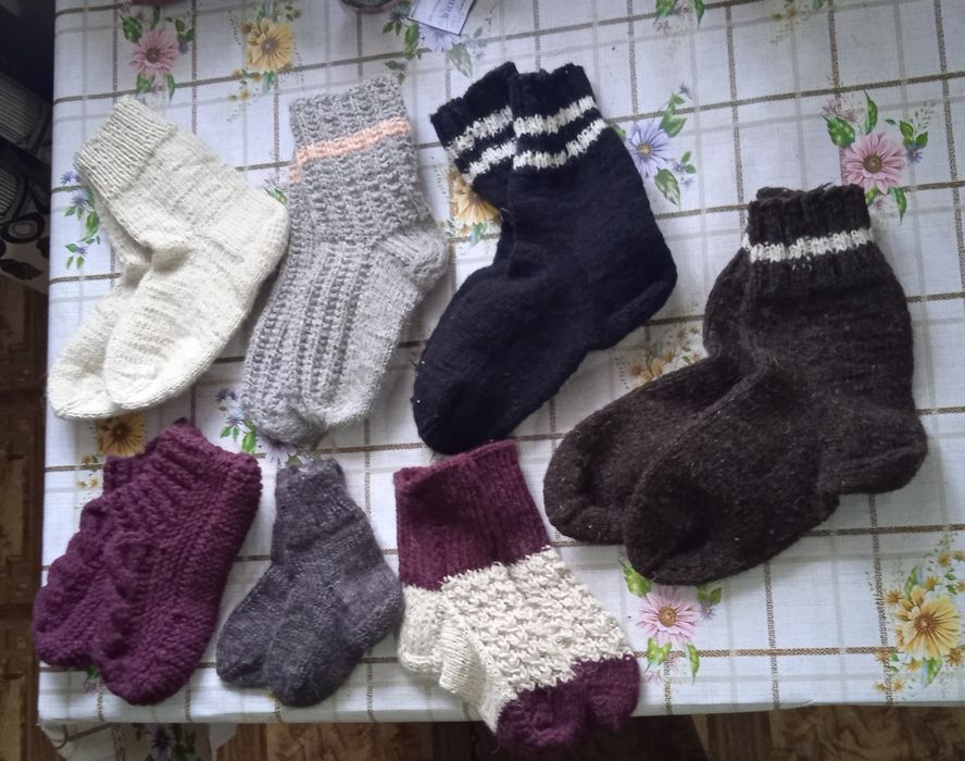 Шерстяные носки и пуховые