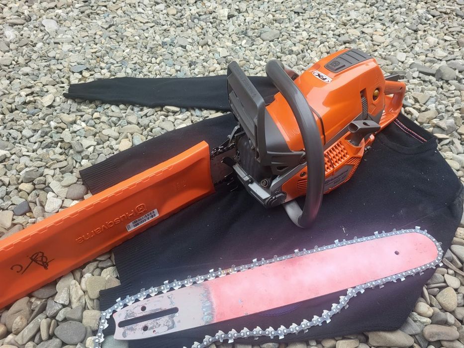 Husqvarna 562 XP cu garanție .Fara urme  sau zgârieturi