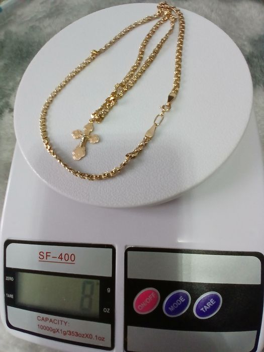 Продаётся золотая цепочка с крестиком