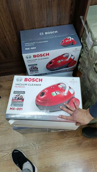 пылесосами Bosch MX-001.