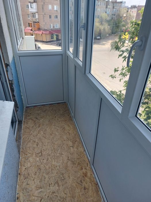 Пластиковые окна двери балконы