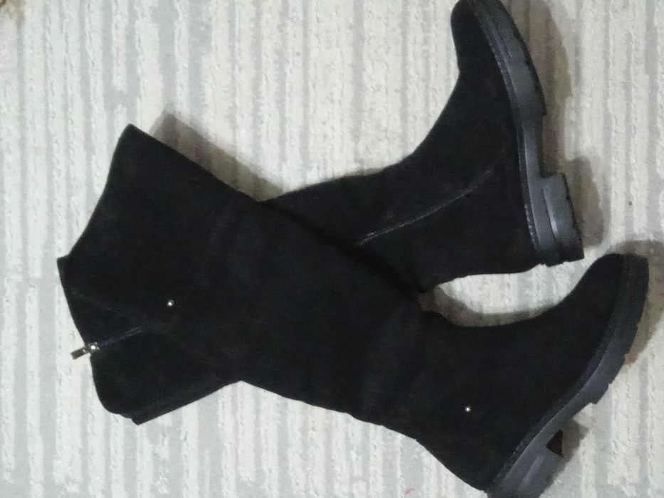 Продам сапоги новые