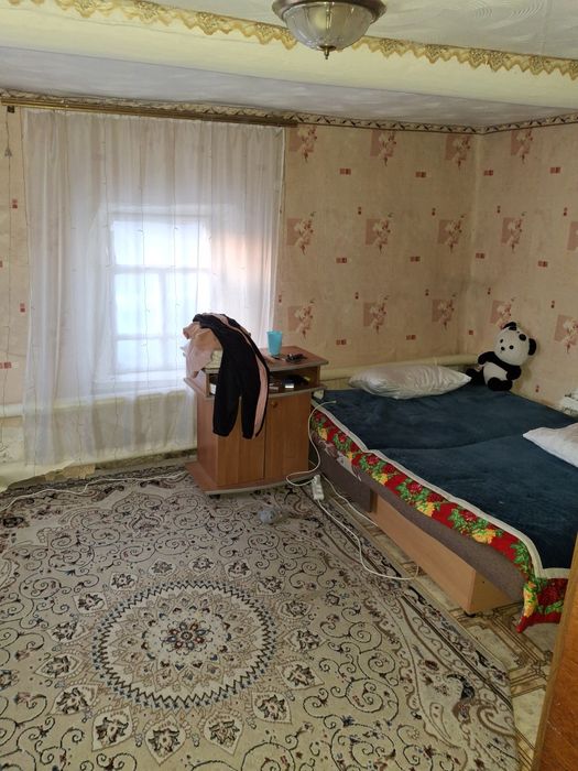 Продам земельный участок  старым домом