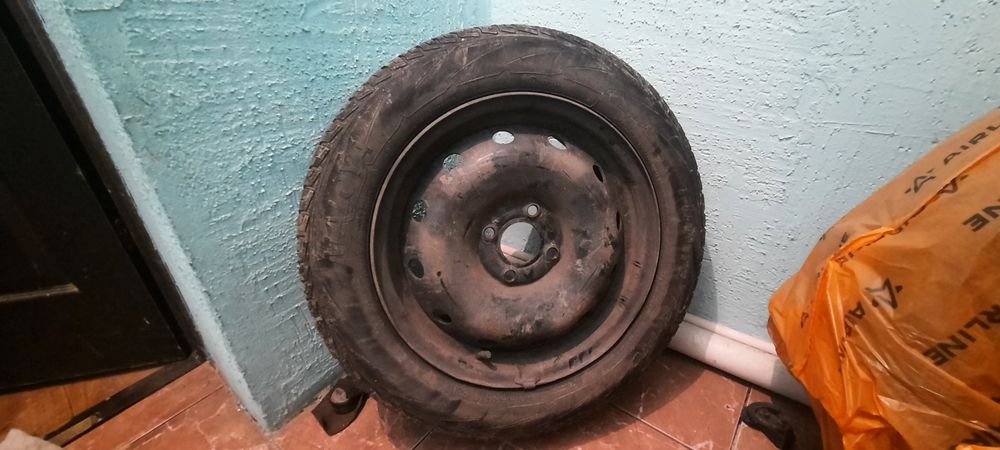 Покрышка с диском на 15