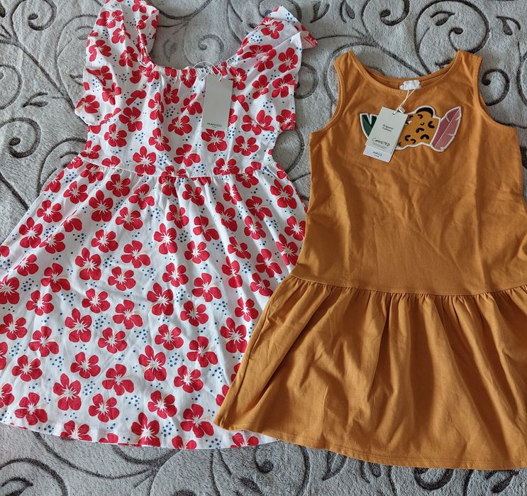 Продават се 2 нови детски рокли Mango 134 cm