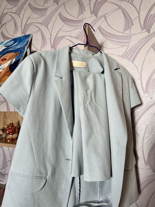 Костюмы с юбками летние