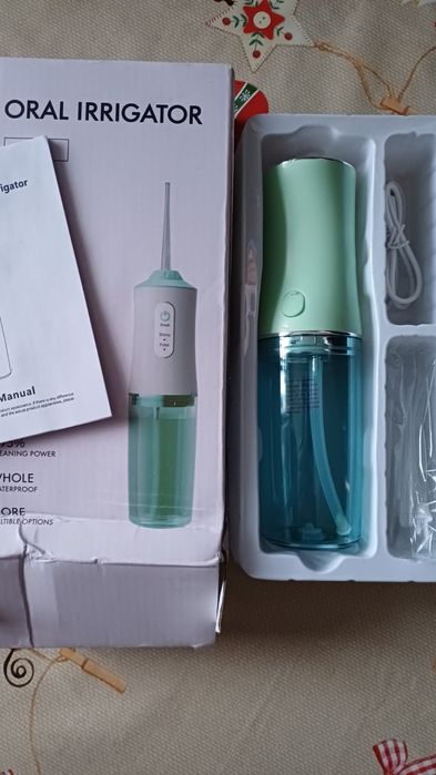 Ирригатор, новый, в упаковке.