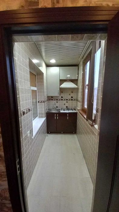 Продается квартира галерейка 2/4/4 сзади Тансикбой базар